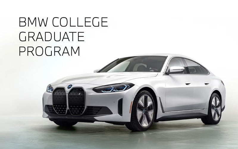 White BMW i4 parked. BMW College Graduate Program. | BMW of Springfield in Springfield NJ